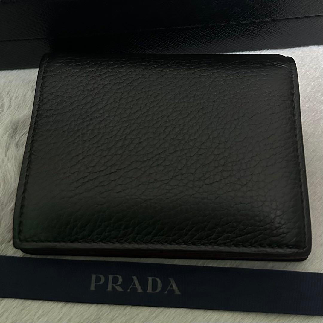 PRADA プラダ　折り財布　ゴールドロゴ　シボ革　バイカラー　赤　黒