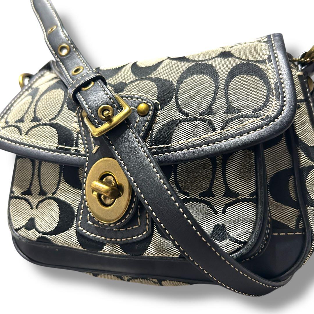 希少 美品 コーチ ショルダーバッグ シグネチャー ターンロック クロスボディ